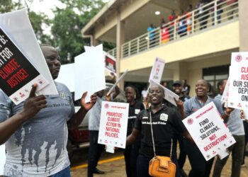 Ugandans join solidarity march for Climate Action, advocate for agroecological investment